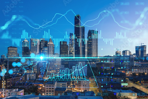 Illuminated aerial cityscape of Seattle, downtown at night time, Washington, USA. Forex graph hologram. The concept of internet trading, brokerage and fundamental analysis