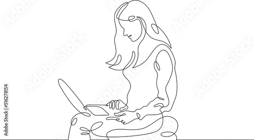 One continuous line. The woman works at the computer. A female character sits at a laptop. Work with mobile Internet.One continuous line is drawn on a white background.