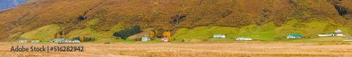 Panorama of a landscape with farms in the south of Iceland in autumn