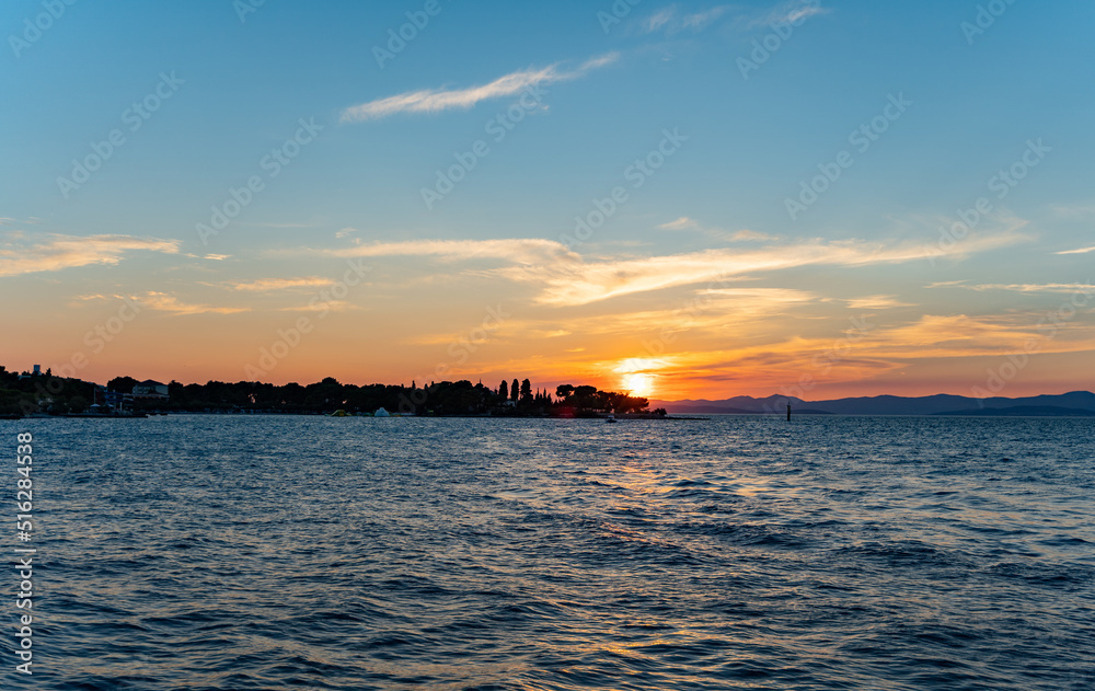 Obraz premium sunset over the coast of Supetar