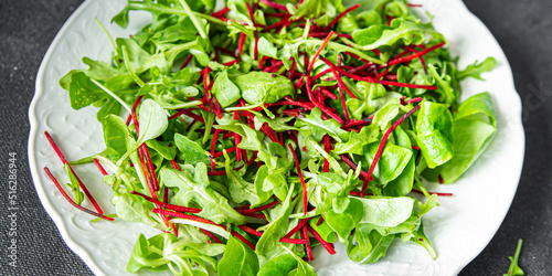 green salad beet leaves mix beetroot, mache leaves, cress fresh healthy meal food snack diet on the table copy space food background veggie vegan or vegetarian food no meat