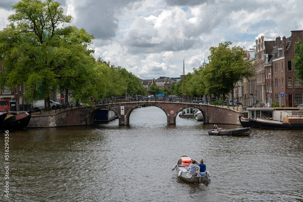 Couple In A Small Boat At The Amstel River At Amsterdam The Netherlands 5-7-2022