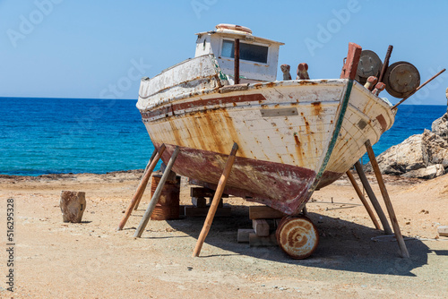 Ios Greece.06-06-2022. Boat lying on the ground near the sea at Ios .Cyclades Islands. Greece.