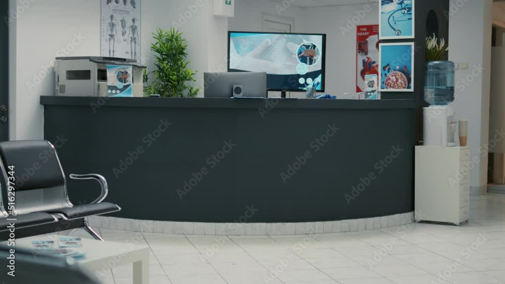 No people in waiting area with reception counter desk at medical clinic, helping patients and giving support at consultation appointment. Waiting room lobby to attend annual checkup visit. No people in waiting area with reception counter desk at medical clinic, helping patients and giving support at consultation appointment. Waiting room lobby to attend annual checkup visit.