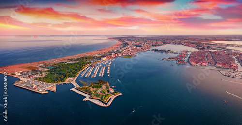 Great sunset on Adriatic sea. Impressive summer view from flying drone of San Felice fortress, Italy, Europe. Traveling concept background.