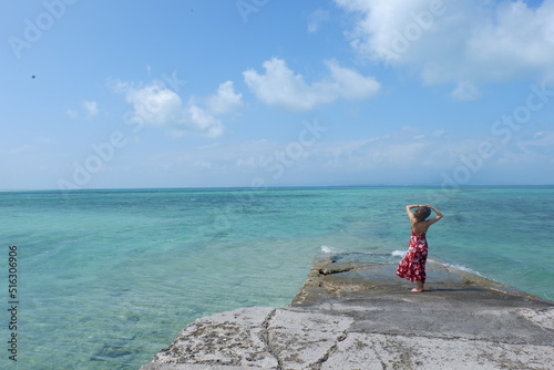 Back view of a woman wearing red dress