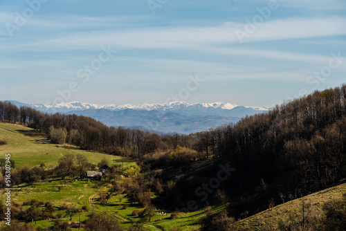 Wonderful view on green hills and mountains. Rural scenery on rolling hills © Anton Tolmachov