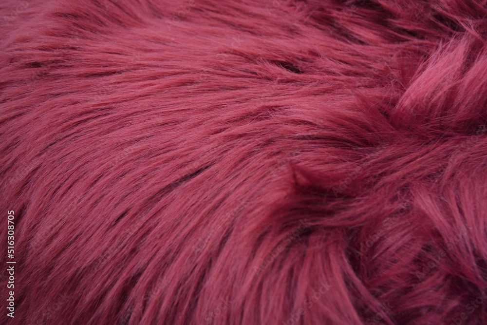 Naklejka premium Fuchsia shaggy long pile artificial fur texture