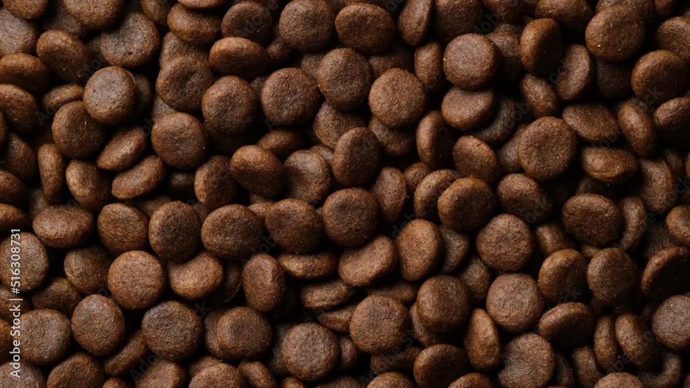 Dry dog or cat food top view, rotate