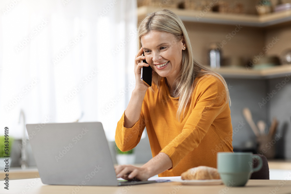 Happy blonde woman entrepreneur having phone conversation Happy blonde woman entrepreneur having phone conversation