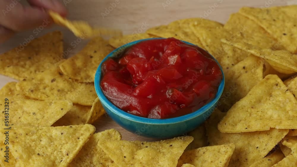 Tortilla chips with spicy tomato salsa