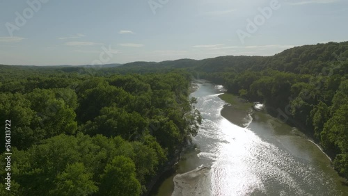 Pull back over the Meramec River in St. Louis, Missouri on a gorgeous summer day. photo