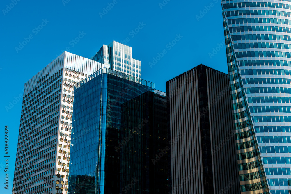 Reflective skyscrapers, business office buildings. Business and finance background of building. cityscape. skyscrapers in city. Skyscraper Business Office building. France. Paris. 