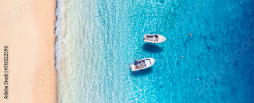Mediterranean sea. Seascape with boats. Aerial view of floating boat on blue sea at sunny day. Top view from drone at beach and azure sea. Travel and vacation image