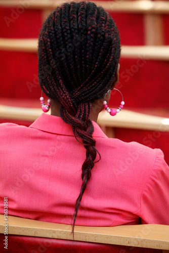 Woman in Holy Trinity church,  Dalston, London photo