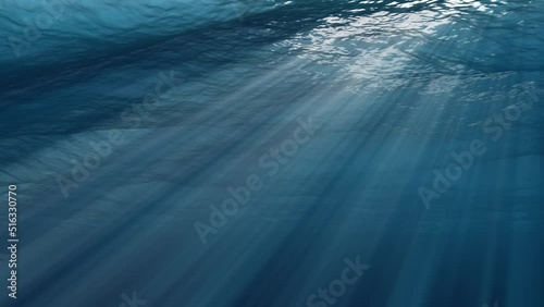 Underwater view with ocean waves flowing in the clear blue water. Beautiful aquatic view with sunbeams shining and creating god rays in the deep sea. 3D animation with swells and tidal waves