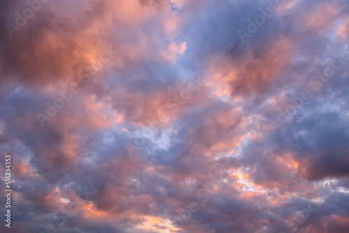 Fototapeta Naklejka Na Ścianę i Meble -  Beautiful evening sky with pink clouds. Sunset over the sea