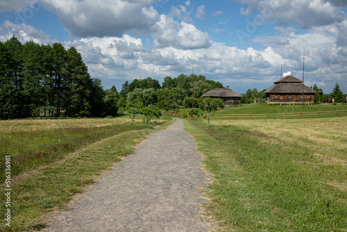 Obraz na plátně In Dalek there are small wooden houses, old houses, a village in the forest
