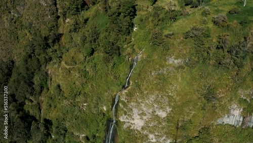 Stunning Cascades Of Virgin Waterfalls In The City Of Baños de Agua Santa In Ecuador. Aerial Drone Shot