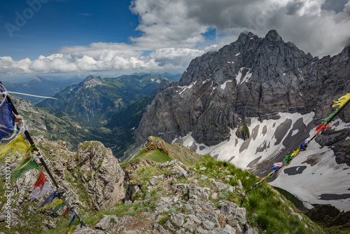 Between Italy and Austria: on the top of mountain near Volaia Lake Raunchkofer Mountain (Lago di Volaia Monte). Mountain hiking Trail Road.