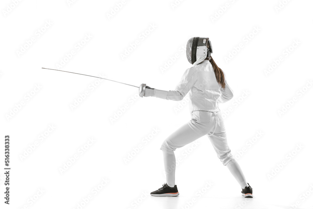 One sportsman, female fencer in white fencing costume in action, motion isolated on white background. Sport, youth, hobbies, achievements, goal. One sportsman, female fencer in white fencing costume in action, motion isolated on white background. Sport, youth, hobbies, achievements, goal.
