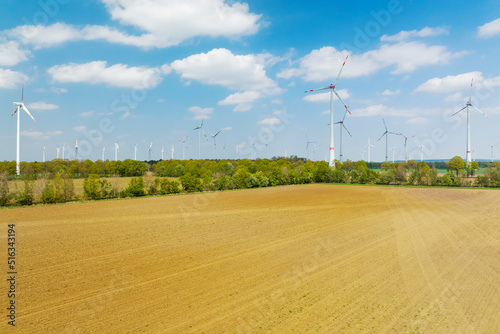 Aerial view of wind turbines and farmland, Muensterland, Nordrhein-Westfalen, Germany. photo