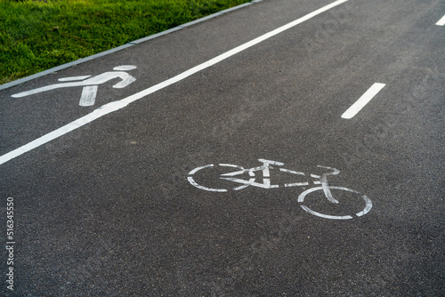 bicycle path, bicycle and running track, pedestrian sign on asphalt