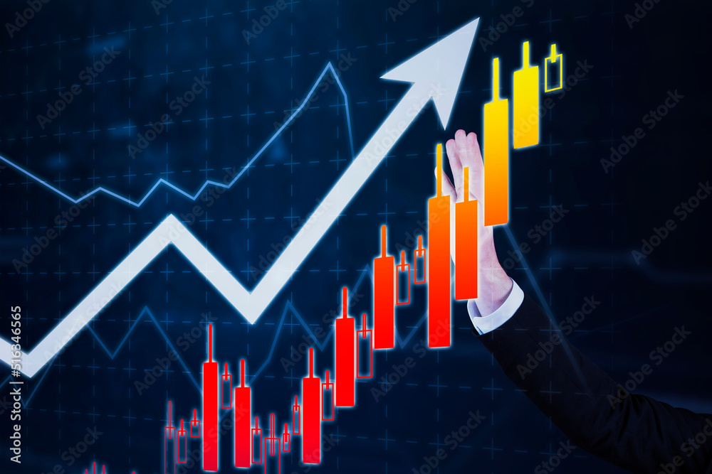 Businessman hand touching growth candlestick chart Businessman hand touching growth candlestick chart
