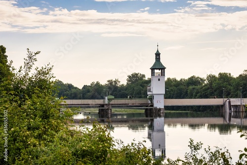 Scenic view of a bell tower in Hochablass weir in Augsburg, Germany photo