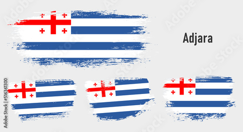 Textured collection national flag of Adjara on painted brush stroke effect with white background
