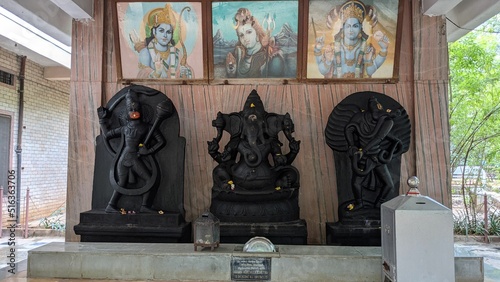 Bild auf Leinwand Closeup of Hanuman, Ganesha, Garuda stone statues with Rama, Shiva & Vishnu imag