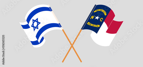 Crossed and waving flags of Israel and The State of North Carolina