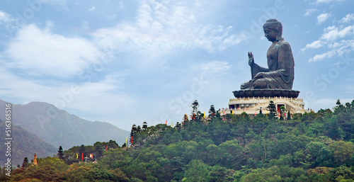 The Tian Tan Buddha statue is the large bronze Buddha statue. This also call Big Buddha located at Ngong Ping, Lantau Island, in Hong Kong. photo
