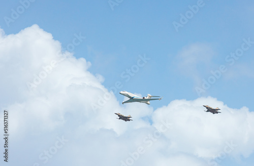 Military aircraft against the blue sky