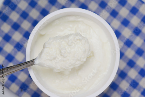 fresh yogurt in a bowl on table 