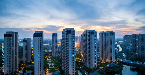 Aerial view of urban buildings residential area scenery in Jiaxing, China, Asia. Beautiful cityscape at sunset.