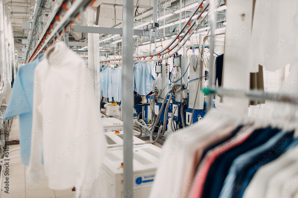 Dry cleaning clothes. Clean cloth chemical process. Laundry industrial
