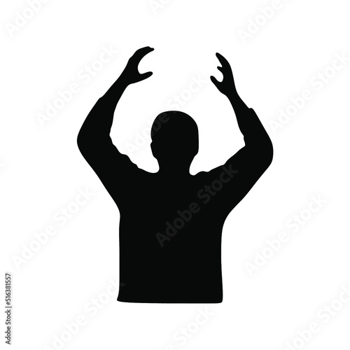 Silhouette of a man with his hands up trying to catch a ball on a white background