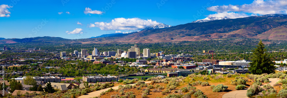 Downtown Reno skyline, Nevada, with hotels, casinos and surrounding mountains