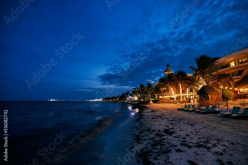 Photography Night illumination of coast, night bars, cafes on beach of Playa del Carmen Quintana Roo Mexico