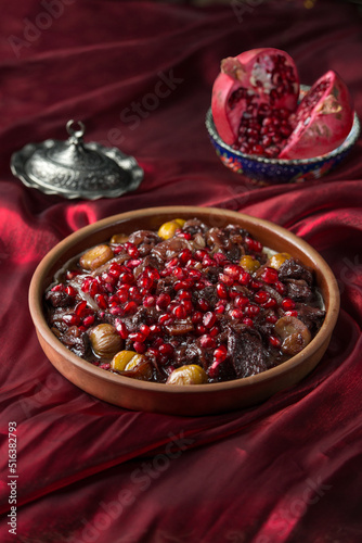 Azerbaijani national dish meat with chestnuts and pomegranate onions from the chef 