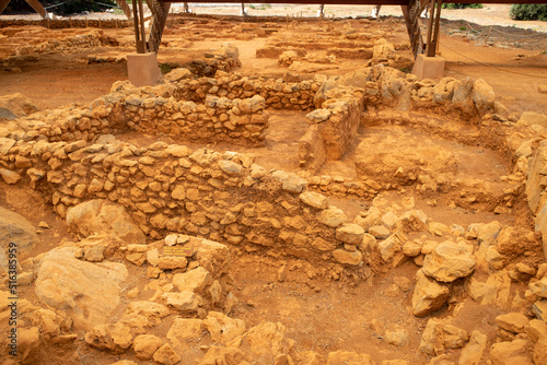 Ancient archaeological site in Crete with stone ruins photo