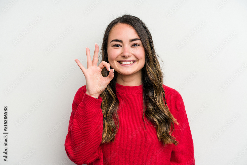 Young caucasian woman isolated on white background cheerful and confident showing ok gesture.