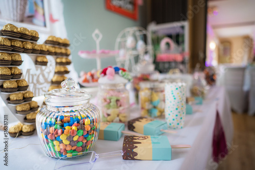 Table with buffet of sweets and desserts of all kinds for young and old at a wedding