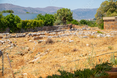 Ancient archaeological site in Crete with stone ruins photo