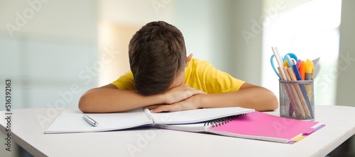 School kid doing homework, Child bored face learning online class room at home, E-learning or Homeschooling education concept