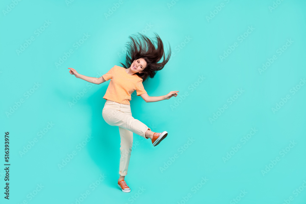 Full size portrait of gorgeous satisfied lady have good mood clubbing isolated on turquoise color background