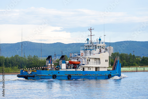 Tugboat for barge on Yenisei river in Krasnoyarsk, Russia