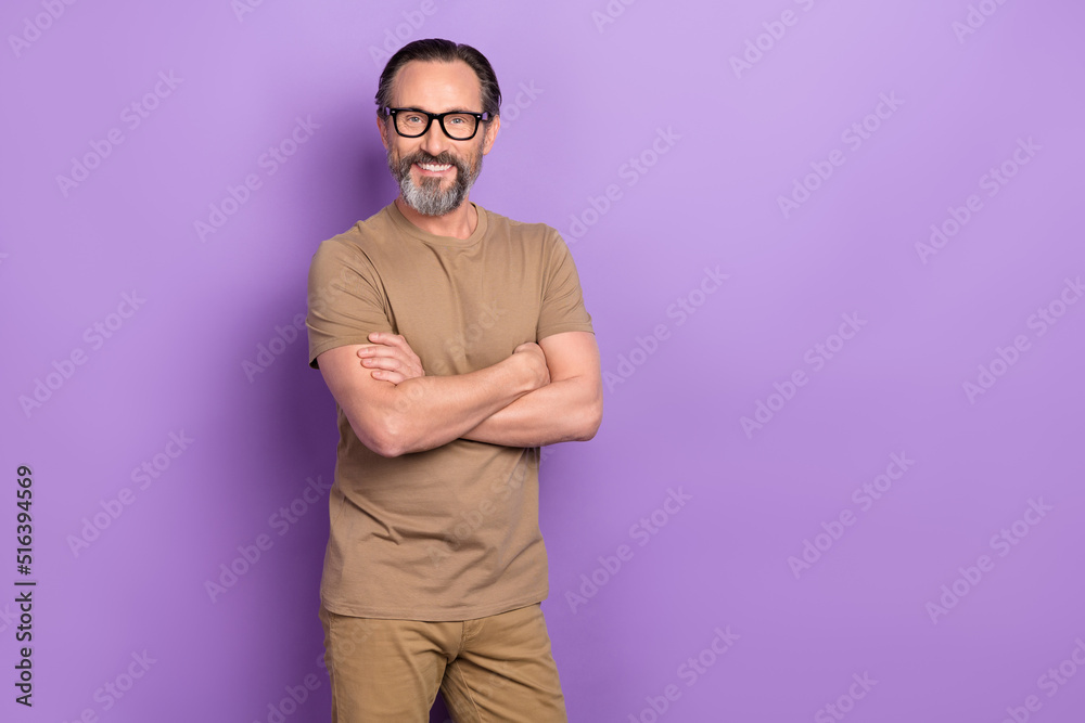 Photo of successful businessman it-specialist working in modern company isolated on purple color background Photo of successful businessman it-specialist working in modern company isolated on purple color background