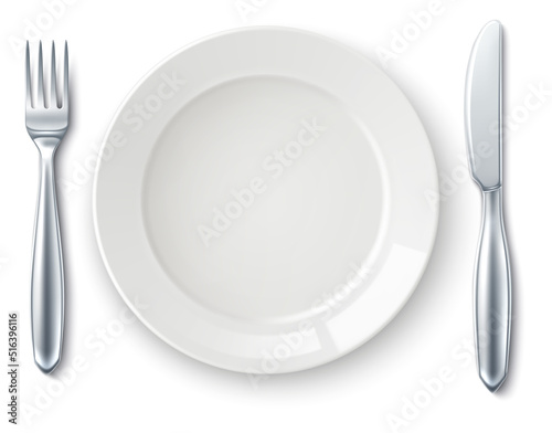 Dining serving dish with fork and knife top view